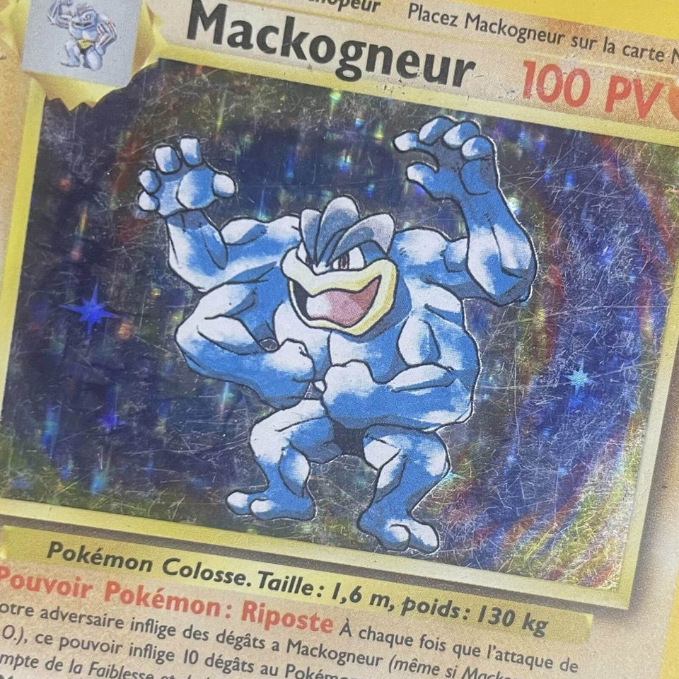 Carta Pokémon Machamp holo (Base Set) antes do restauro: holo riscado e baço
